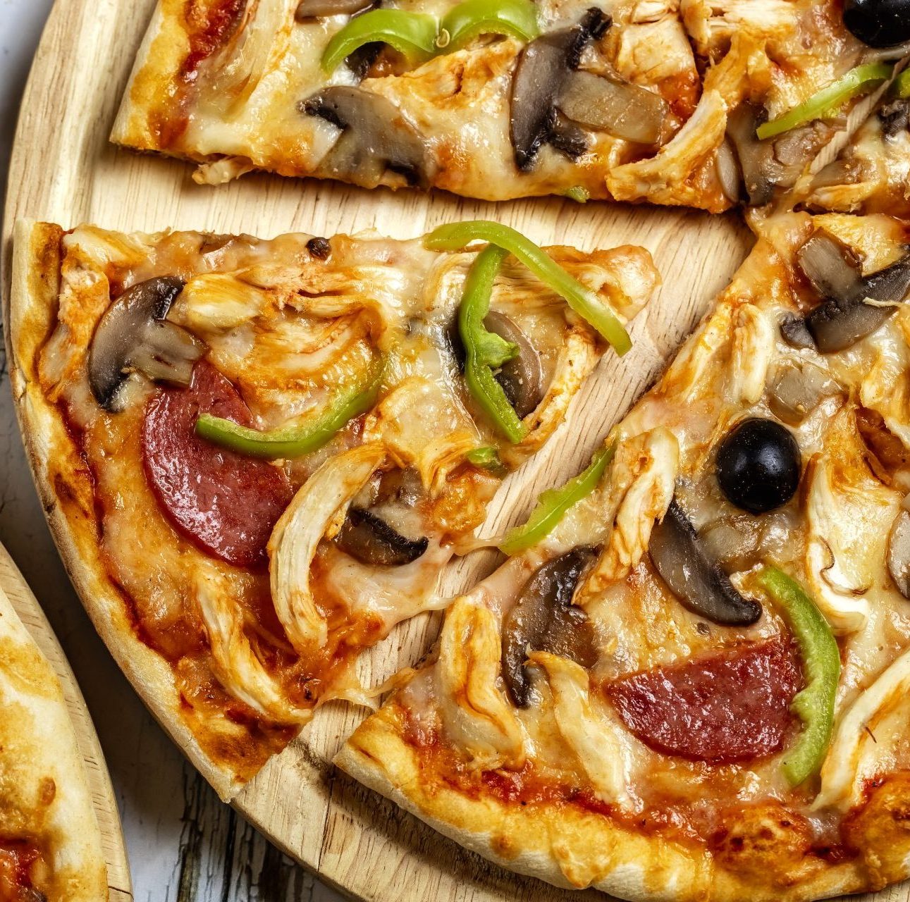 top-view-chicken-pizza-with-salami-mushrooms-bell-pepper-chicken-black-olive